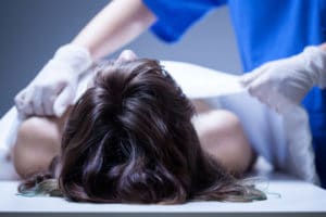 view of nurse covering the dead body